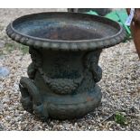 An antique cast iron garden urn/vase top (one handle detached, socle base missing)