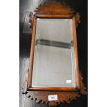Antique bevelled wall mirror in burr walnut fret cut frame, 58 cm high x 30 cm deep
