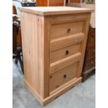 A modern pine three drawer tall boy chest with ring handles, 74 cm wide x 48 cm deep x 104 cm high