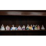 Eleven Royal Doulton small figures of ladies (each 9-10 am high) to/w six miniature examples (5.5 cm