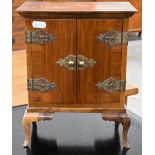 Miniature French-style kingwood two-door cabinet on cabriole supports, stamped 'H Uphill, Wilton',