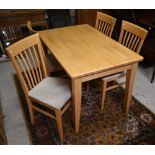 A modern veneered beech dining table to/w a set of four side chairs, 122 x 77 x 76 cm h