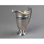 Urn-shaped silver cream jug in the Regency manner, on circular foot rim, 5.3oz, Roberts & Belk,
