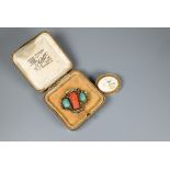 An Oriental vintage part buckle set carved coral and turquoise to/w an oval ceramic set brooch