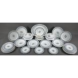 A Wedgwood pottery Ravilious design dinner service, comprising nine each 25.5 cm dinner plates and
