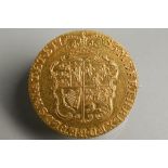 A George III half guinea dated 1785, with added brooch fitting, approx 9g all in