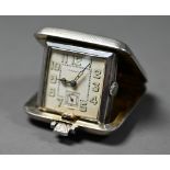 A silver cased Elkington travel watch, Birmingham 1933, size 38 x 38 mm,  1.69 ozt all-in good