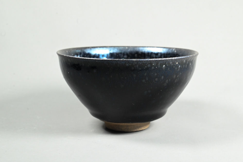 A Chinese Jianyao 'oil spot' bowl in the Song Dynasty style, covered in a thick unctuous black glaze