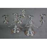 Pair of plated on copper three-sconce candelabra on baluster stems, 21cm high