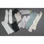 A box of various lady's gloves including calf, evening, driving etc