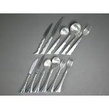 Yvonne Renouf-Smith: Two unmarked white metal modern design six-piece cutlery sets, 30oz (not