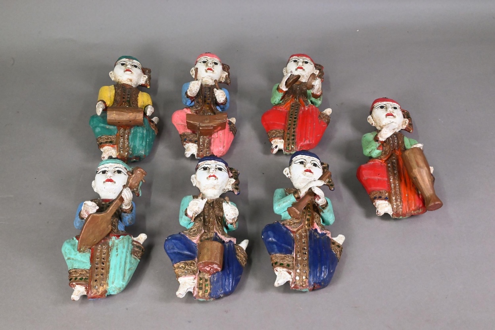 A set of seven vintage polychrome Burmese temple musician wall plaques, carved hardwood with - Image 2 of 9