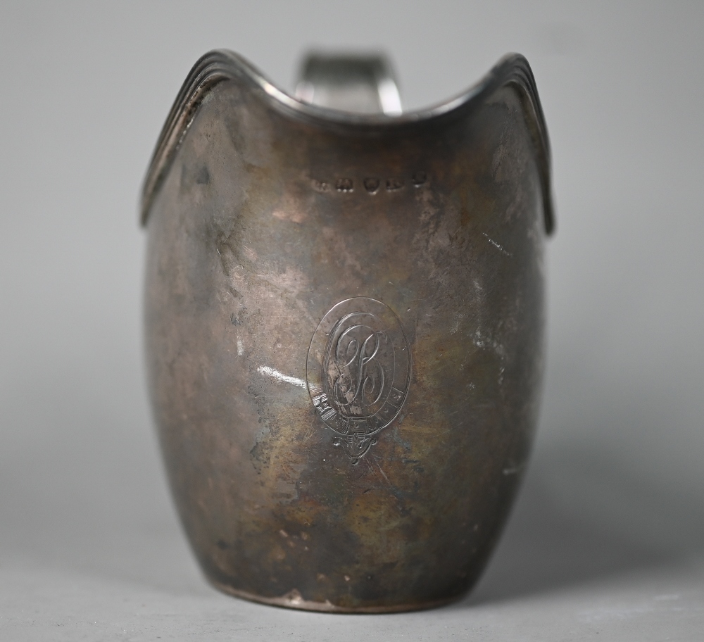 Paul Storr: a George III helmet cream jug with reeded rim and scrolling strap handle, London 1812, - Image 3 of 6