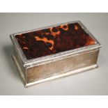 A silver cigarette box with tortoiseshell-inset top, W.G. Sothers & Co, Birmingham 1923, 15cm wide.