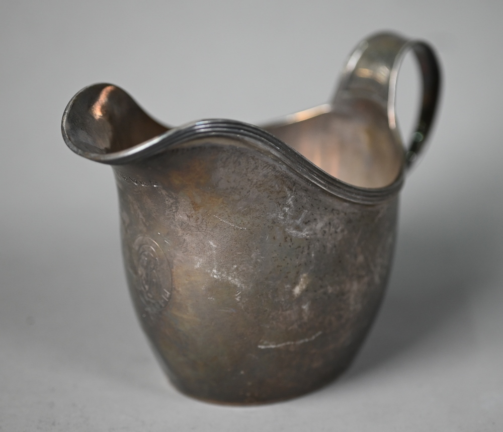 Paul Storr: a George III helmet cream jug with reeded rim and scrolling strap handle, London 1812, - Image 4 of 6