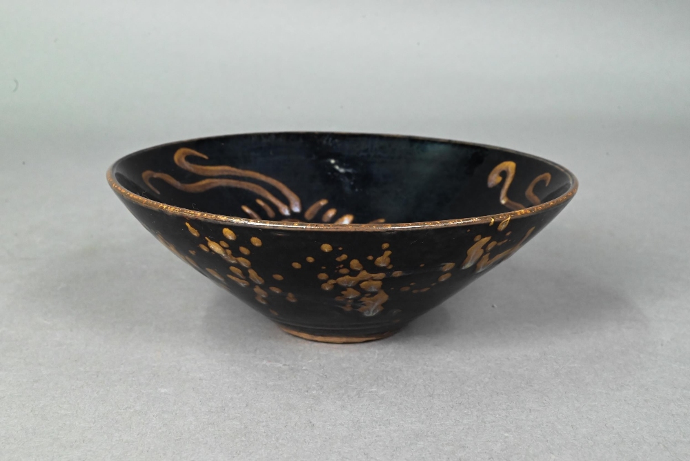 A Chinese Southern Song style Jizhou stoneware bowl, the interior with three paper-cut phoenix