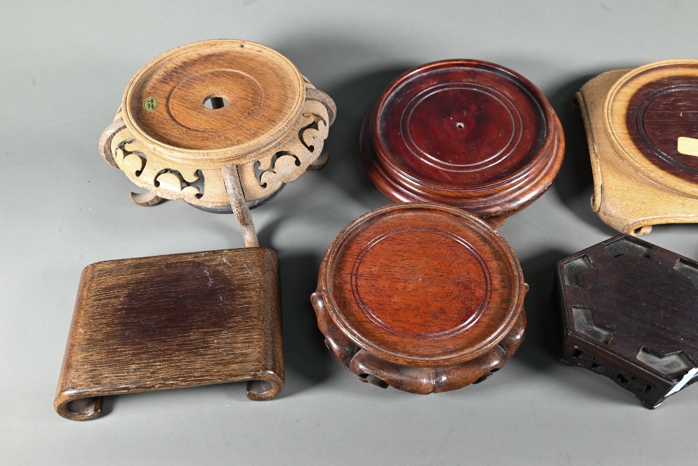 Eleven various Chinese stained hardwood carved and pierced display stands (11) - Image 3 of 4