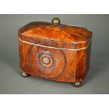 A Georgian tortoiseshell and ivory strung tea caddy, with twin lidded canister tops to the interior,