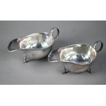 Pair of silver sauce boats with scroll handles and hoof feet, Martin, Hall & Co, Sheffield 1925, 7.