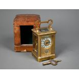 A miniature brass cased carriage alarm clock, 9 cm h