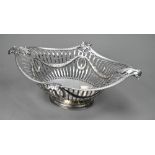 Adam revival silver basket with chased foliage and wreath decoration, on oval raised foot, James