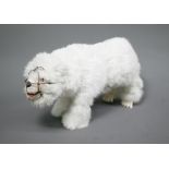 A scarce Roullet et Decamps automaton polar bear with white fur and wire muzzle, 34 x 18cm; walks