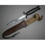 A United States M3 fighting dagger, the 16 cm blade with hardwood grip (no wiring) in M8Al