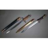 An E26 bayonet, the sngle fuller blade with wood grip, in steel scabbard to/w another bayonet and