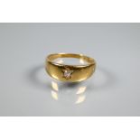 An 18ct yellow gold ring set small diamond, size P, approx 4g all in