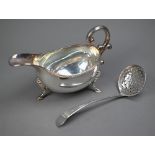A George III silver old English pattern sifter ladle, Richard Crossley, London 1788, to/w a sauce
