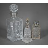 An Edwardian cut glass scent bottle and stopper, with silver cover, Walker & Hall, Chester 1907,