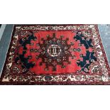 A contemporary North West Persian Tafresh rug, the brown-red ground with stylised floral