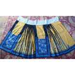 An early 20th century Chinese pleated skirt, Qun, late Qing or Republic period, the yellow damask