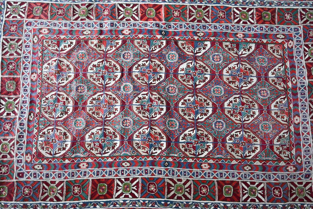 A North Indian Kashmiri Turkoman design chain-stitched rug or wall hanging, embroidered in - Image 2 of 4