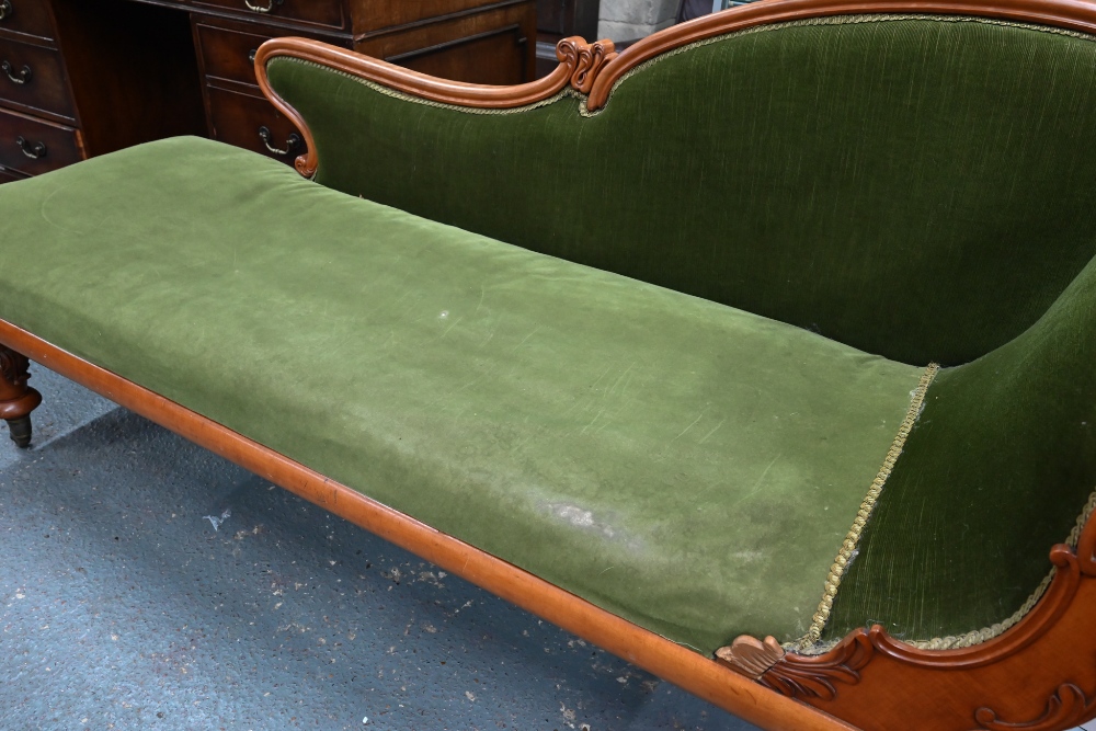 A late Victorian walnut framed single scroll end chaise, upholstered in green dralon, raised on - Image 8 of 8