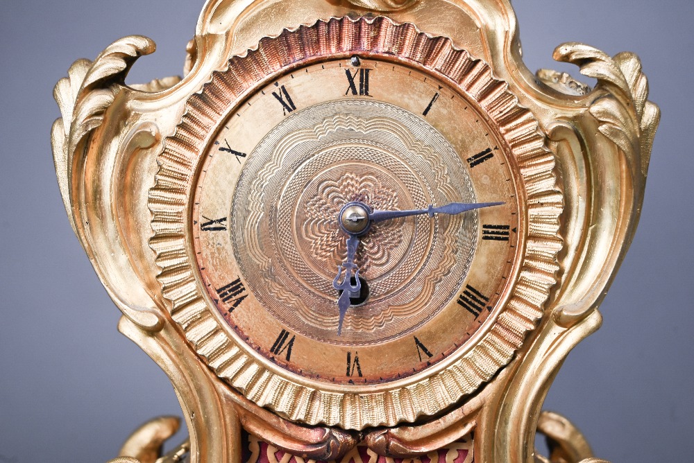 A French gilt ormolu cased 8-day fusee mantel clock, in the rococo style, with engine turned dial, - Image 3 of 6