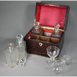 A Georgian brass-bound mahogany campaign box, converted to a decanter box with four matching antique