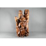 A yew wood carving of Chaucerian Pilgrims by Helen Chaddick, 42 cm high (Yew from Bentley