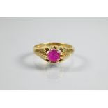An 18ct yellow gold ring set with single ruby, size Q