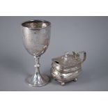 Silver pot-bellied mustard in the Regency manner, with blue glass liner, Chester 1911, to/w a goblet