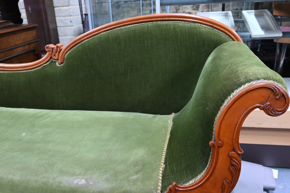 A late Victorian walnut framed single scroll end chaise, upholstered in green dralon, raised on - Image 7 of 8