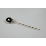An oval cabochon banded agate stick pin engraved 'Lord Lyons' to reverse, 8 cm long, in fitted box