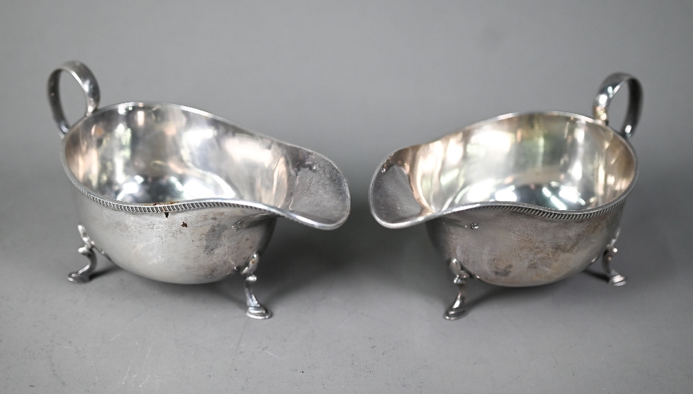 Pair of silver sauce boats with scroll handles and hoof feet, Martin, Hall & Co, Sheffield 1925, 7. - Image 2 of 5