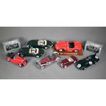 Four Burago model cars - Jaguar 'E' Type (1961) (2), Ferrari 250 Testa Rossa (1957) and Jaguar