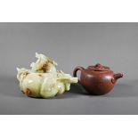A green hardstone (possibly onyx) naturalistic design teapot and cover, green with russet
