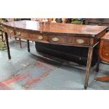 A Victorian mahogany bow-fronted sideboard with three drawers, raised on square tapering legs to