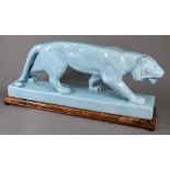 An L&V Ceram large turquoise-glazed stalking tiger with overall crackle finish, on rectangular