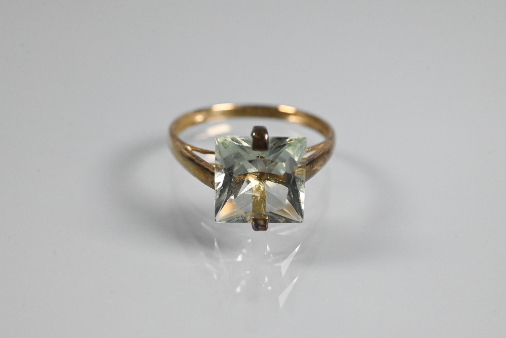 An oval aquamarine set in yellow metal scroll setting stamped 585, size O c/w accompanying - Image 2 of 9
