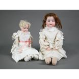 Two Heubach Koppelsdorf 275 bisque-headed dolls with stitched leather bodies, 49 cm and 38 cm