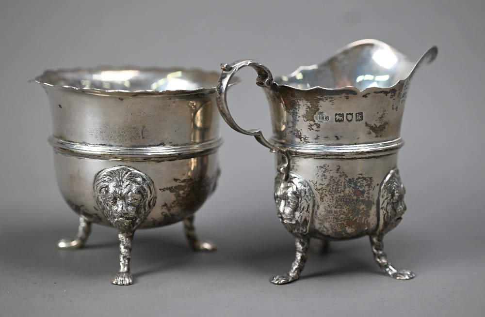 An Edwardian silver cream & sugar pair, with cut rims, scroll handles and lion-mask monopodia, - Image 3 of 5